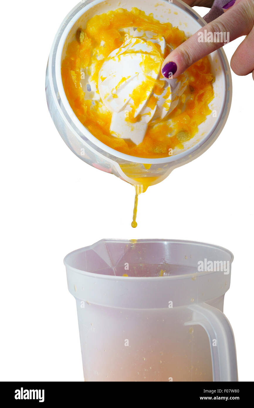 Freshly squeezed orange juice in a jug pure white isolated background Stock Photo