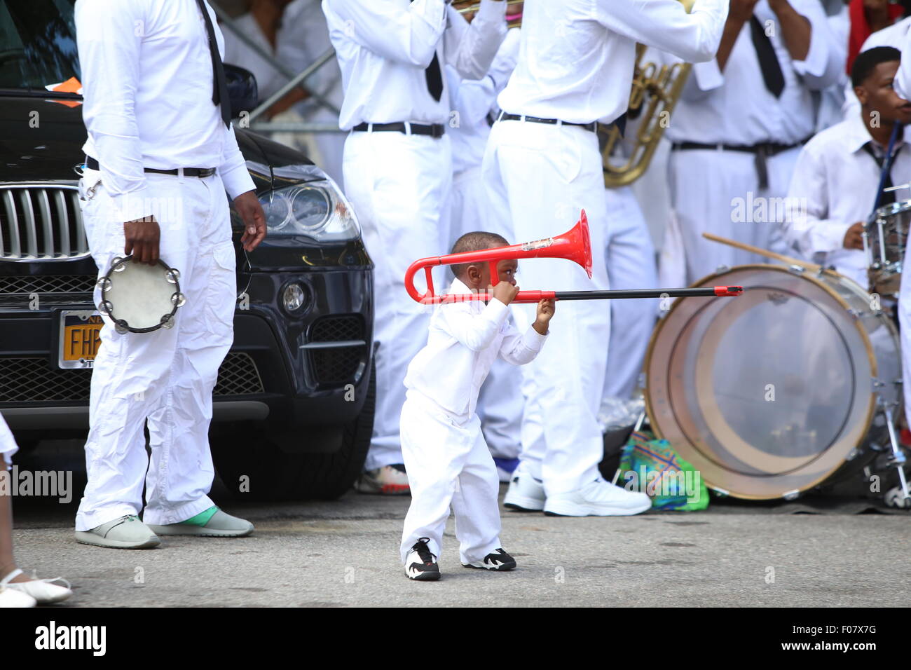 New York City, United States. 09th Aug, 2015. Little trombone player