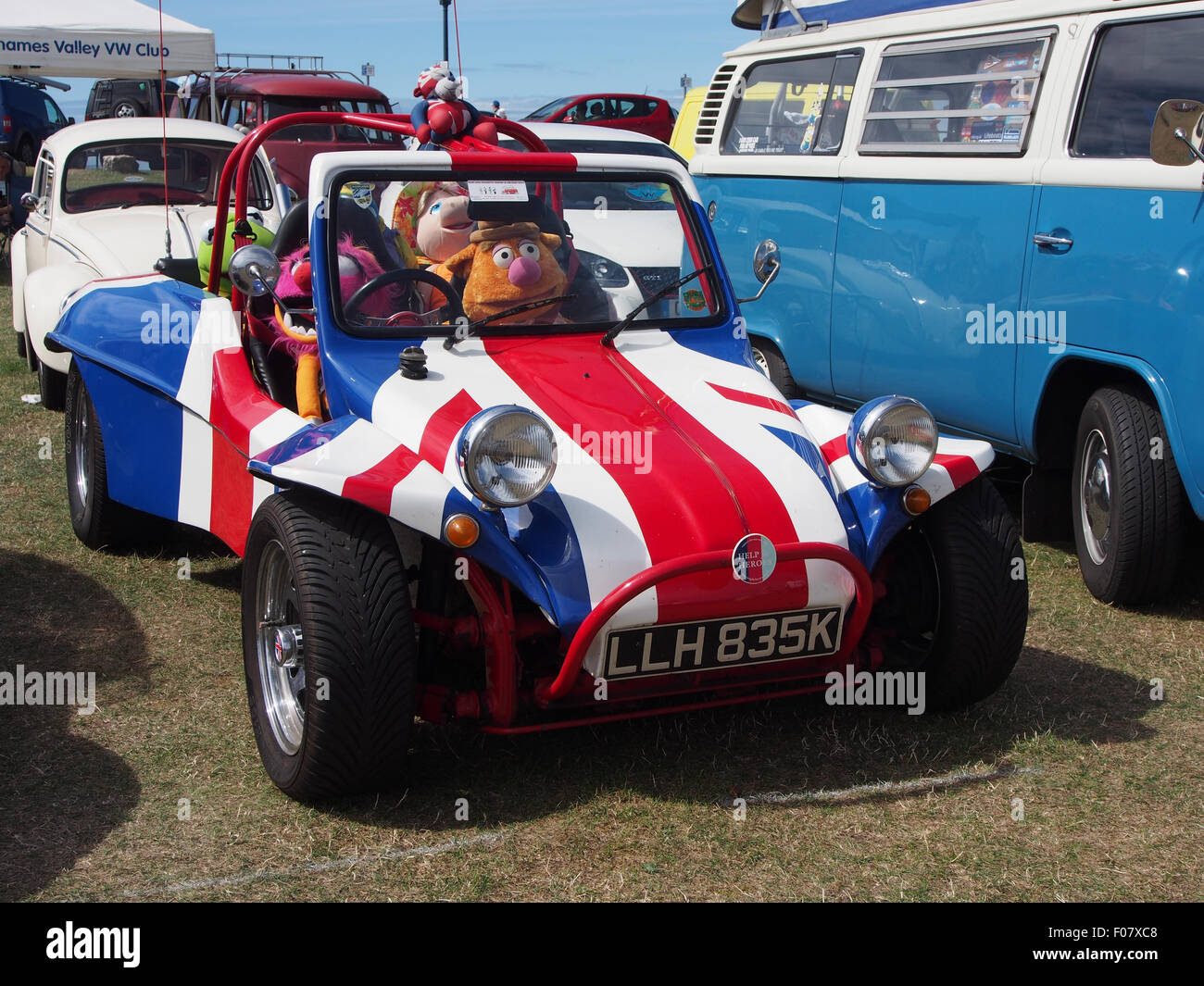 Volkswagen beach buggy painted union flag colors with muppets  sat in the seats Stock Photo