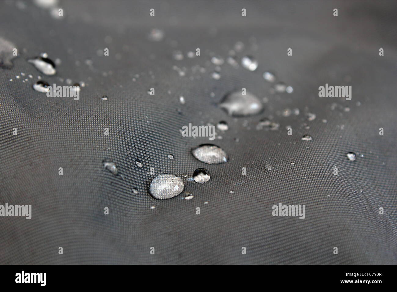 water drops on waterproof textile material - short depth of field Stock Photo