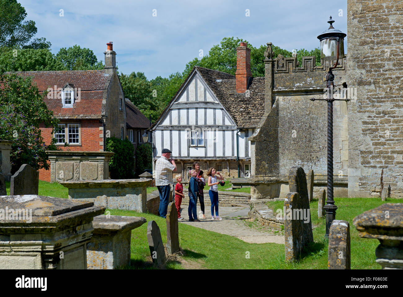 The churchyard of St Cyriac's Church, in the village of Lacock, Wiltshire, England UK Stock Photo