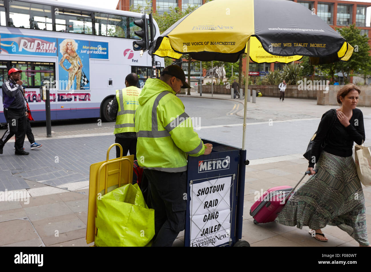 Manchester evening news street newspaper seller in manchester UK Stock Photo