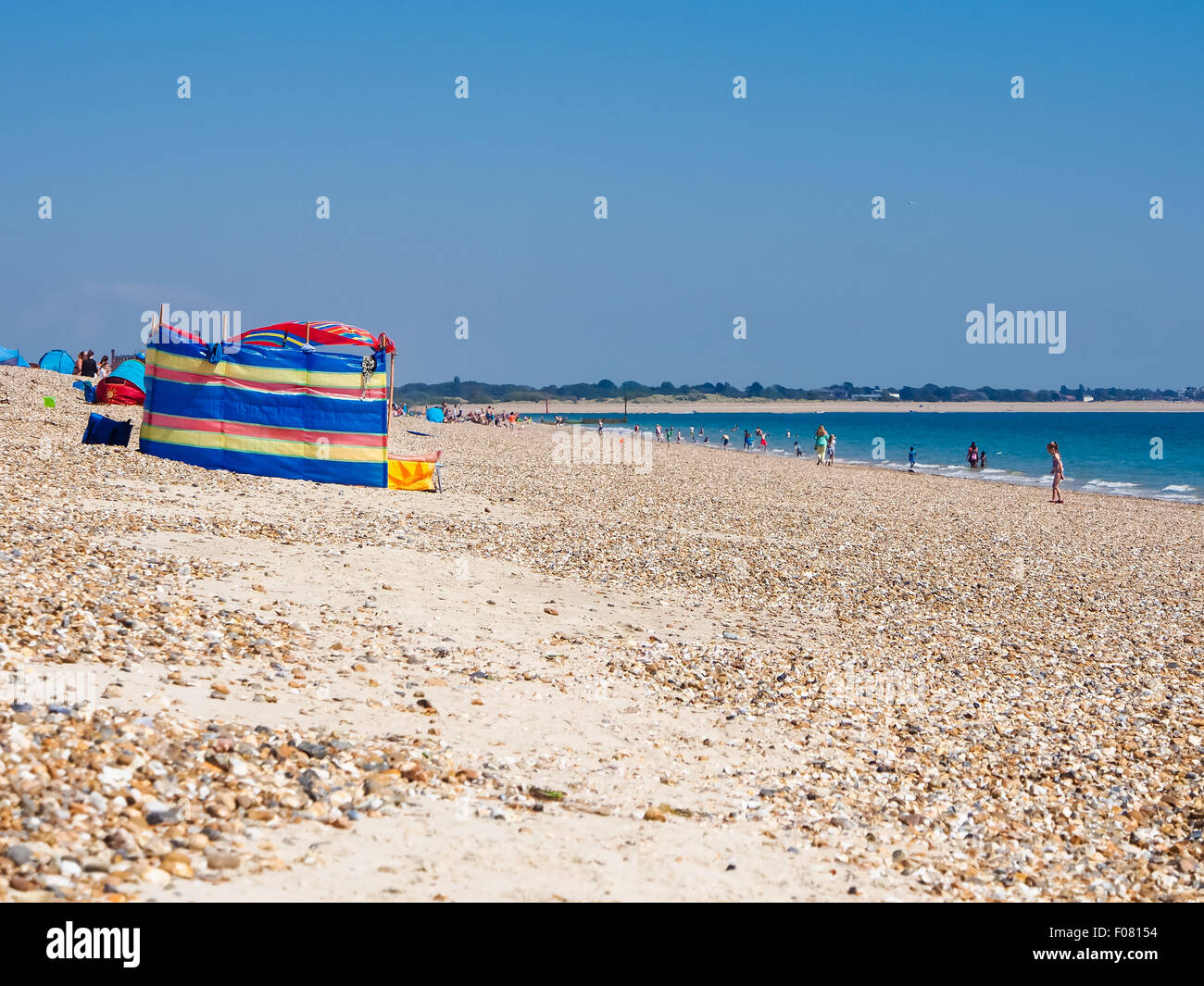 A wind break on a beach in summer Stock Photo