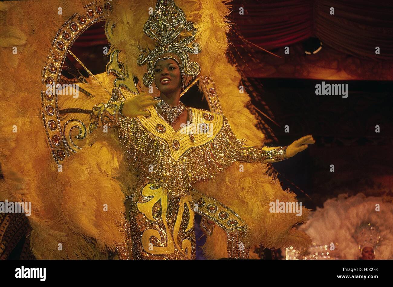 Samba Dancer wearing colourful costumes in Rio de Janeiro at dusk ...