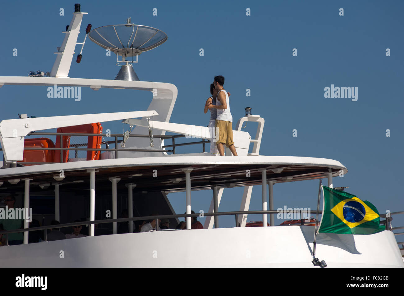Manaus, Brazil. A couple dancing on the roof of the deck of a ship on the  Amazon river Stock Photo - Alamy