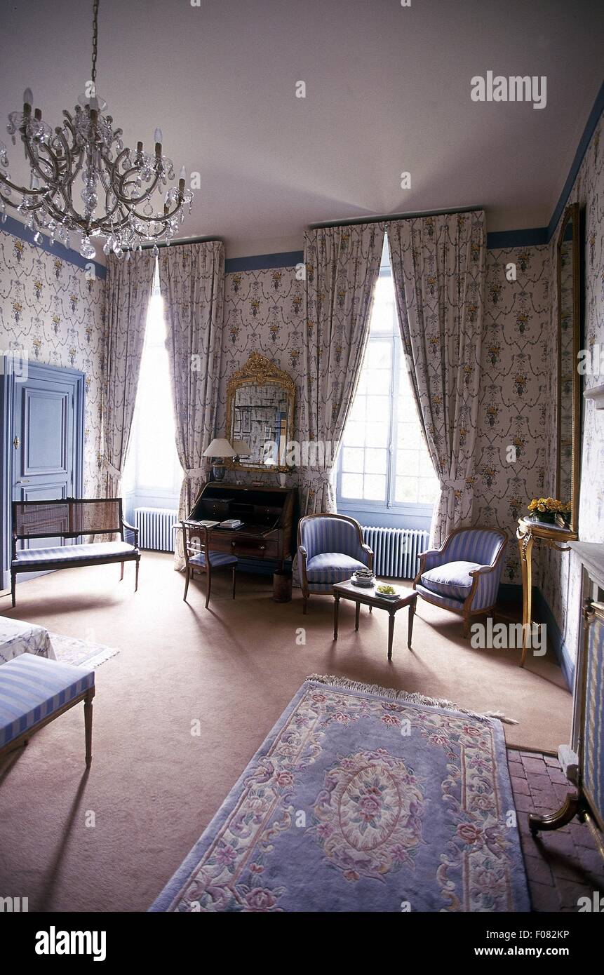 Luxorious suite with antique furniture in Chateau De Noirieux Hotel, Briollay, France Stock Photo