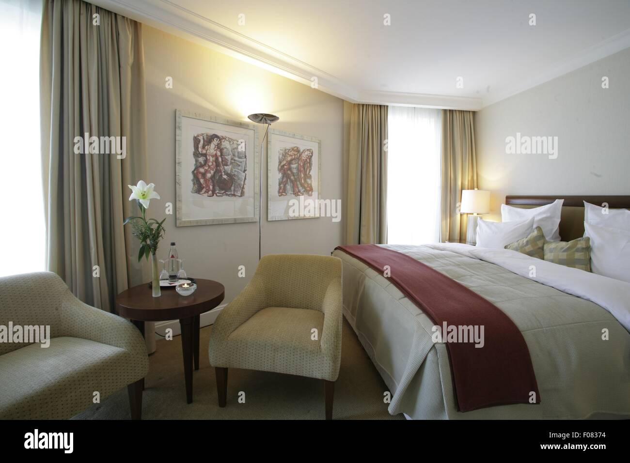 Interior of bedroom in Dorint Sofitel Maison Messmer, Baden-Baden, Germany Stock Photo