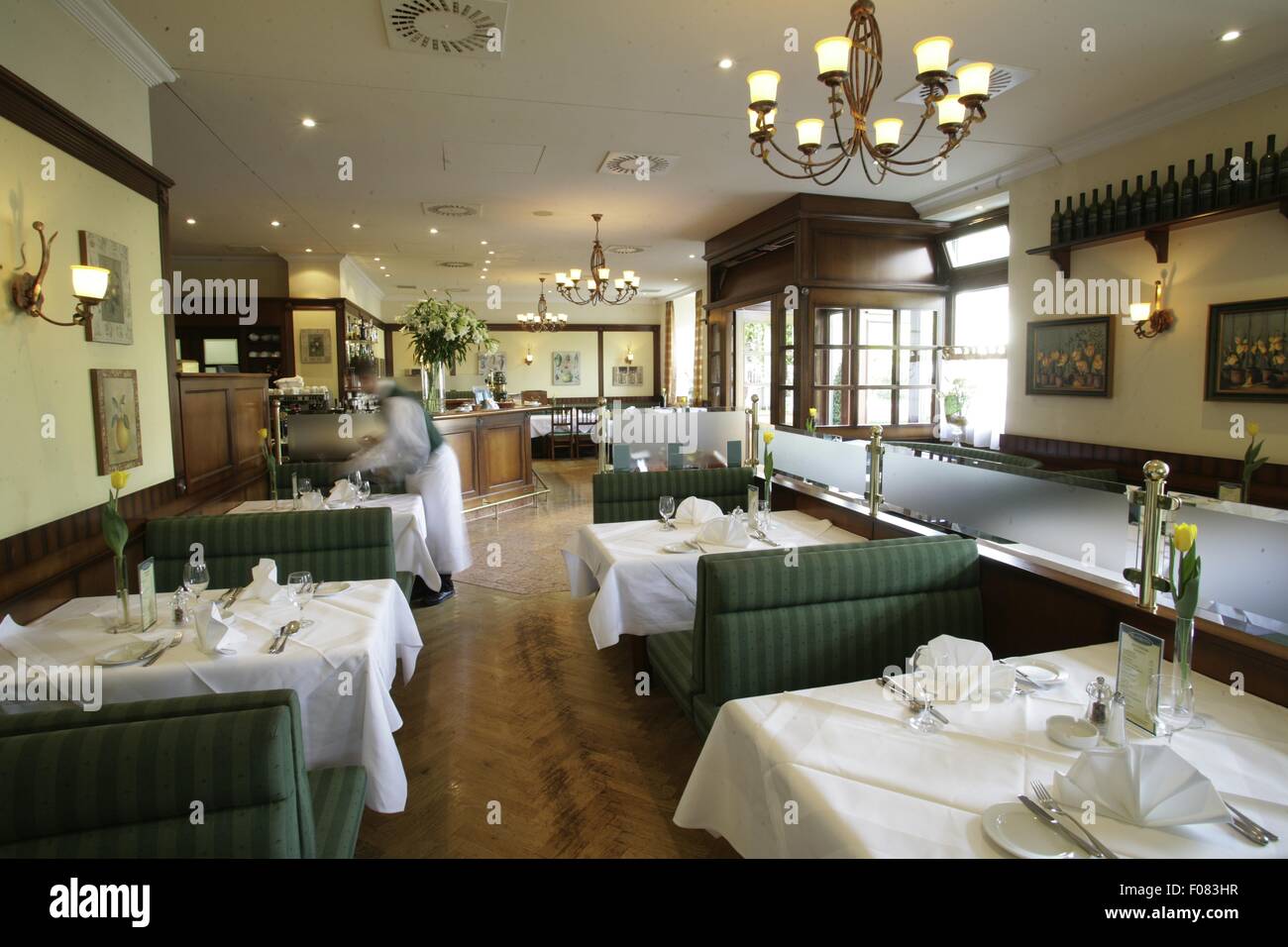 Tables laid in restaurant, Austria Stock Photo - Alamy