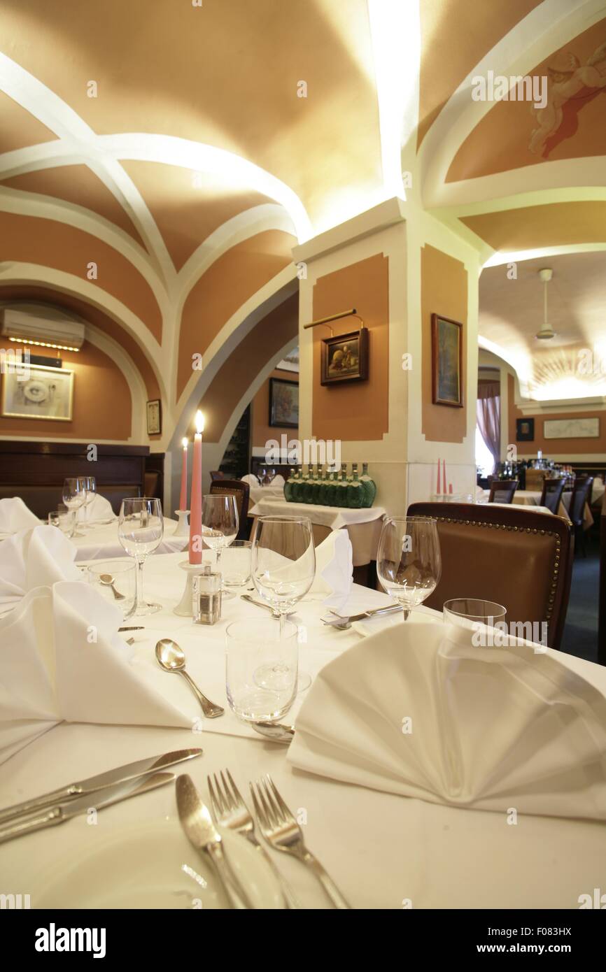 Tables laid in restaurant, Austria Stock Photo - Alamy