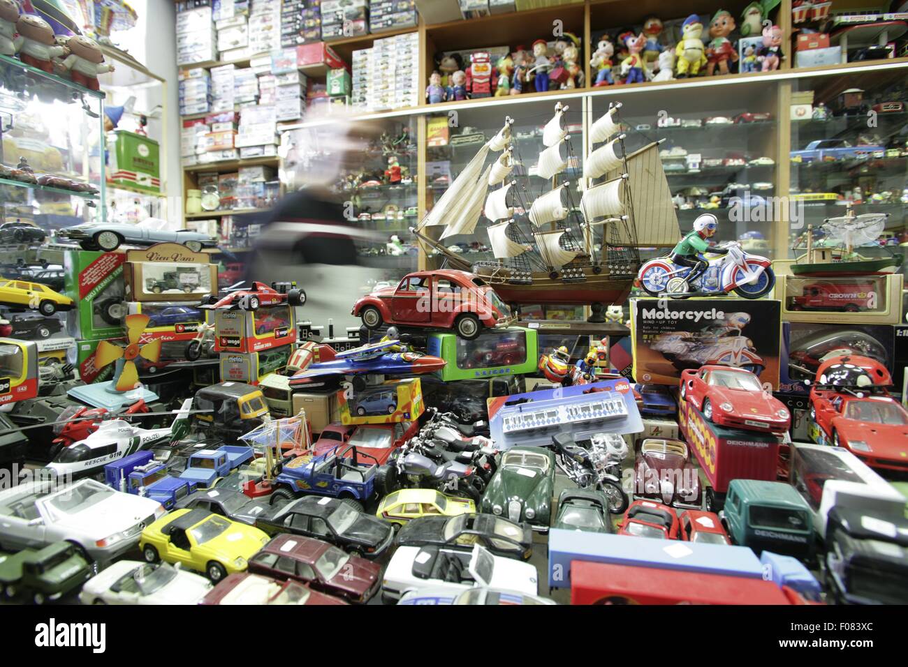 Various types of toy cars in shop blurred motion Stock Photo Alamy