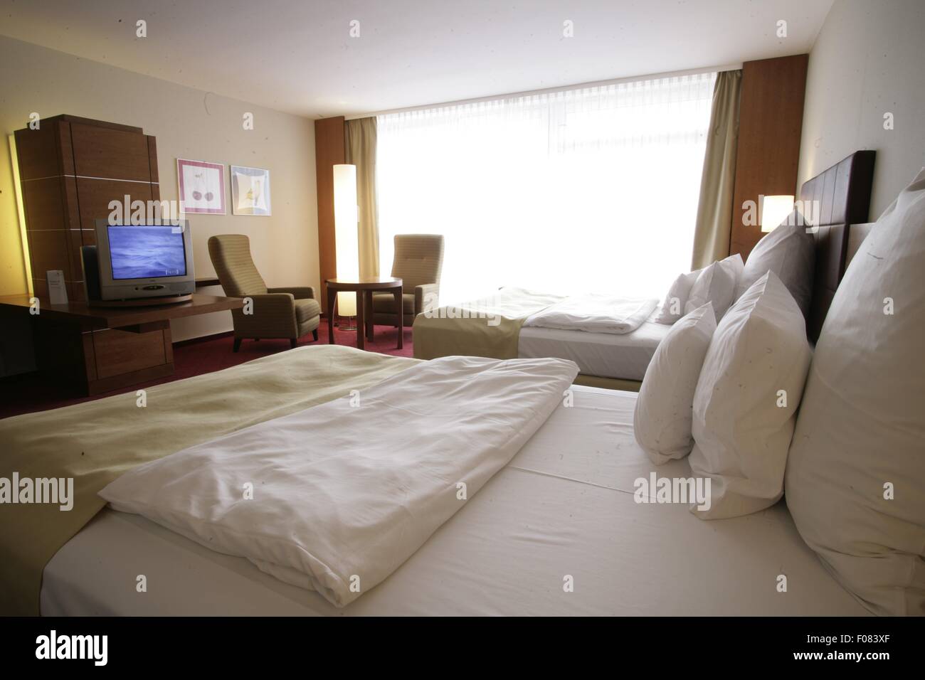 Bedroom of hotel, Germany Stock Photo Alamy