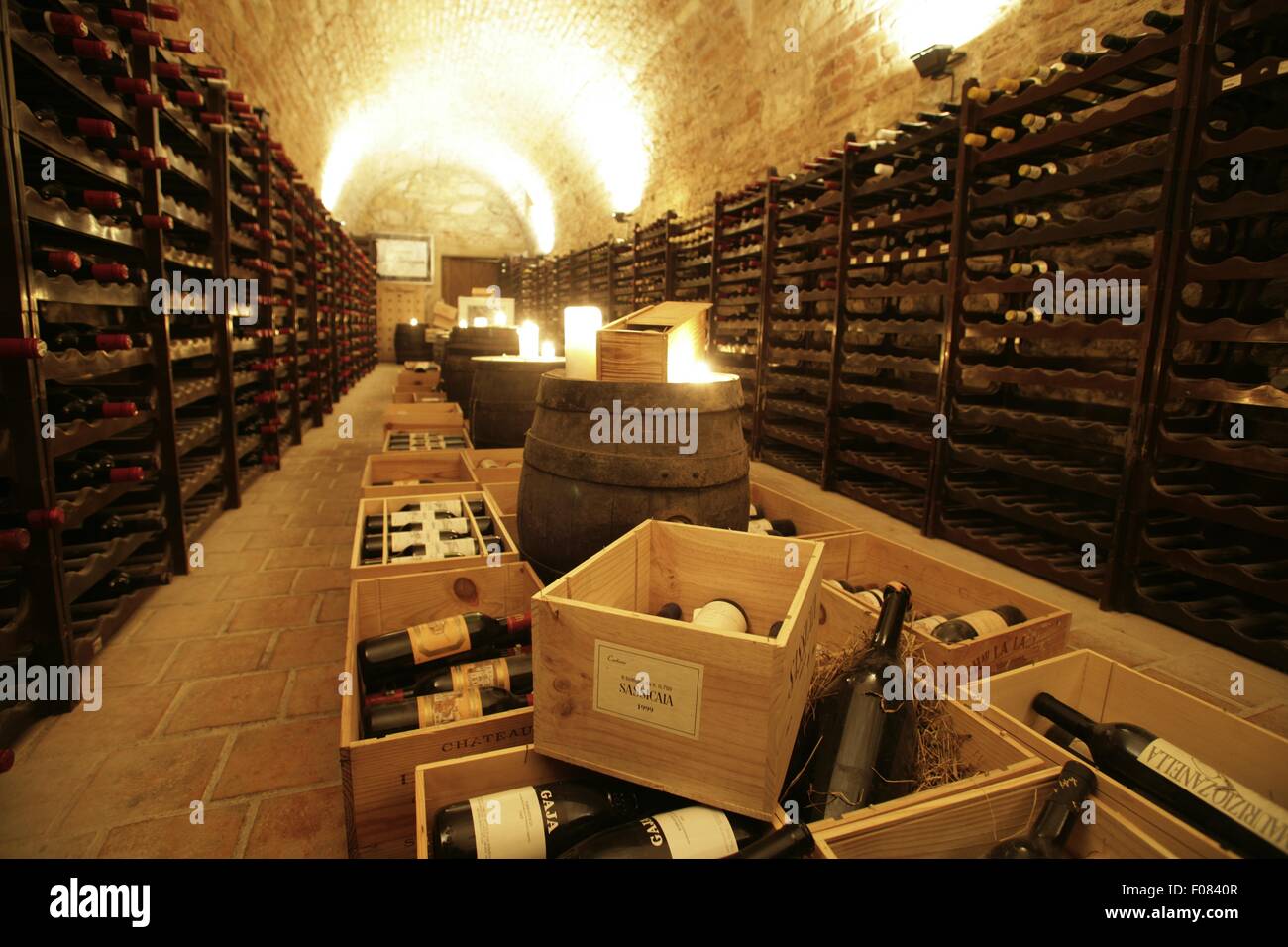 Wine bottles in wooden crates at wine cellar of restaurant, Czech