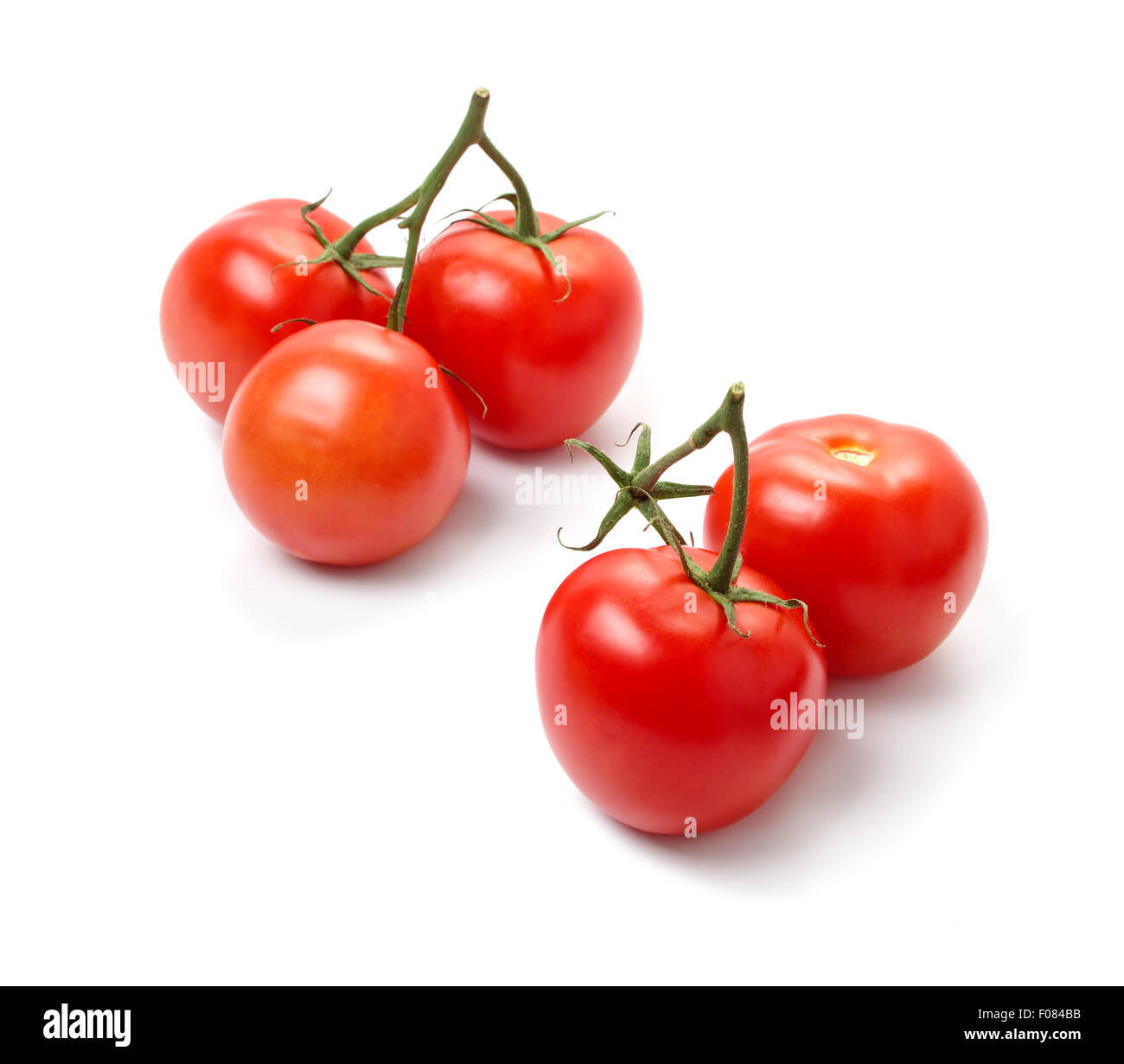 Fresh red tomatos isolated on white background Stock Photo - Alamy