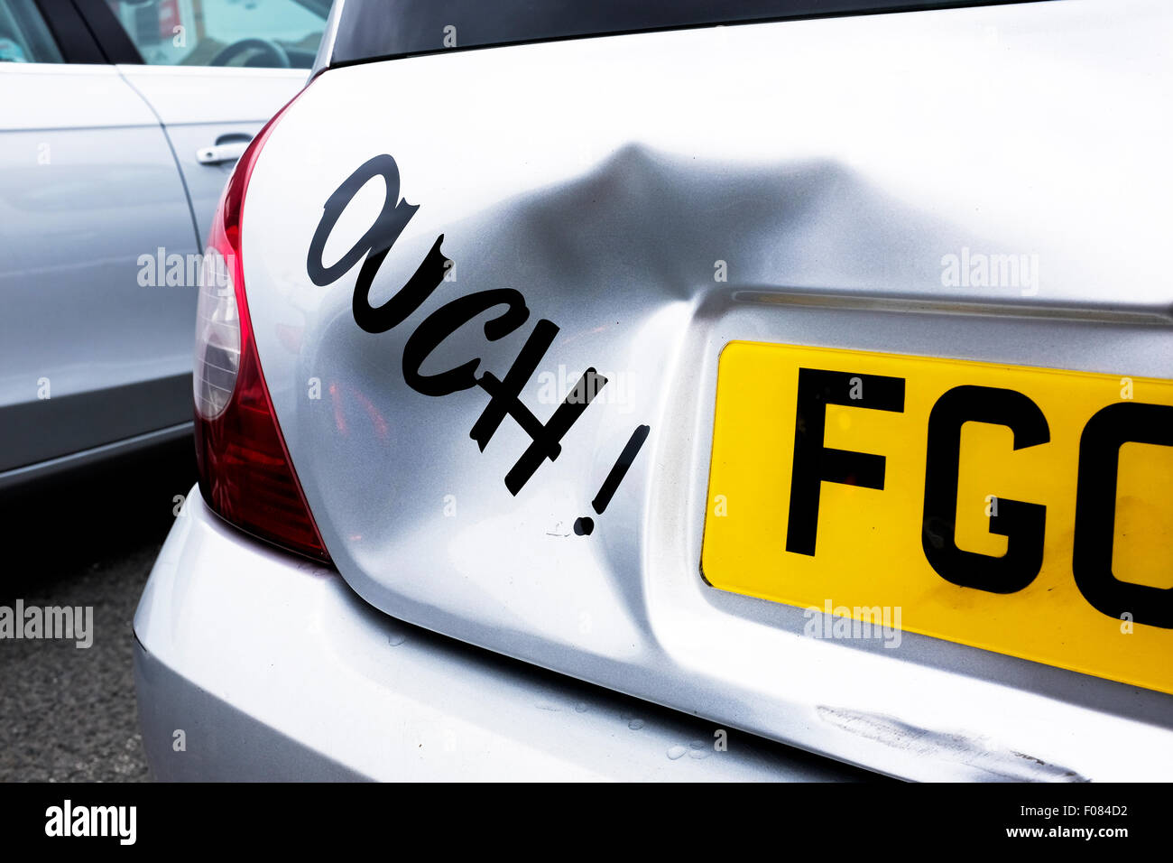 Crash damage to the back of a car, showing the creased boot lid Stock