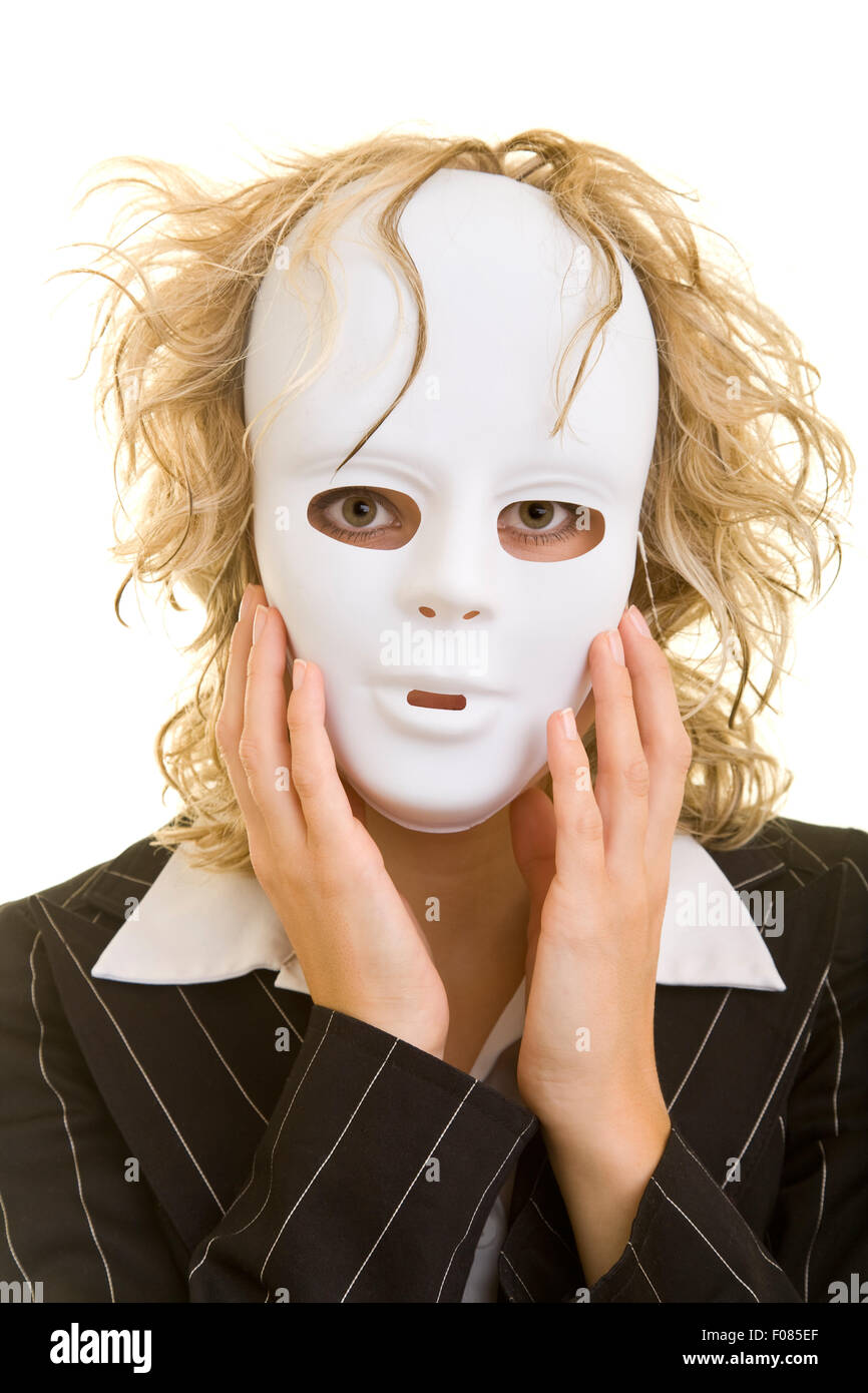 Blonde business woman with white mask in front of her face Stock Photo
