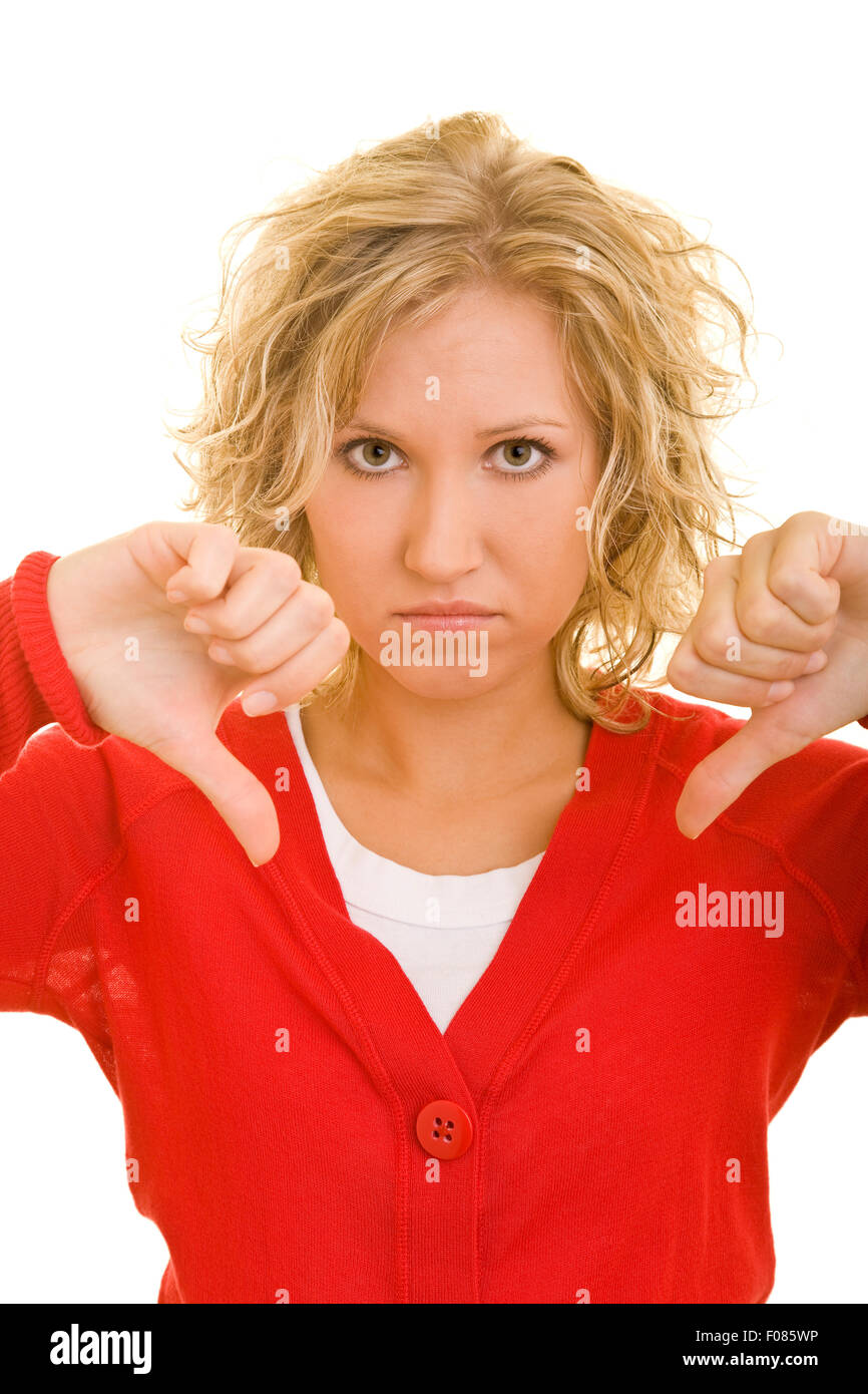 Young dissapointed woman holding both thumbs down Stock Photo