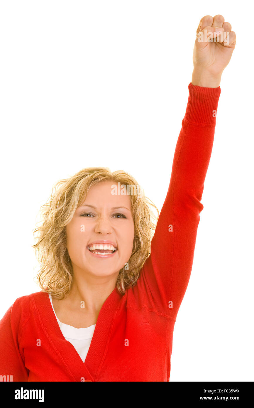 Happy blonde cheering woman clenching her fist Stock Photo Alamy
