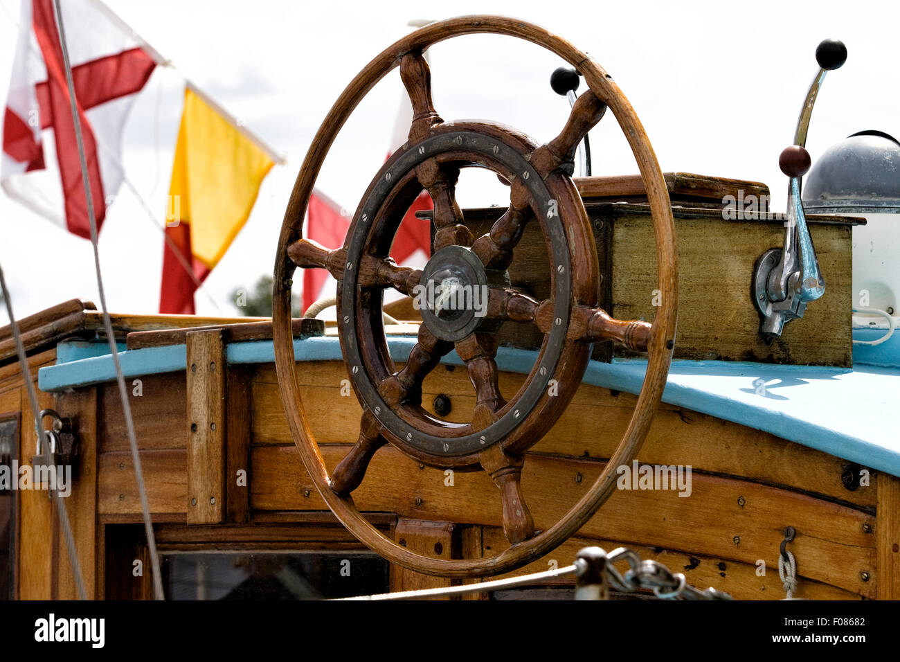 Wooden vintage steering wheel on a boat Stock Photo Alamy