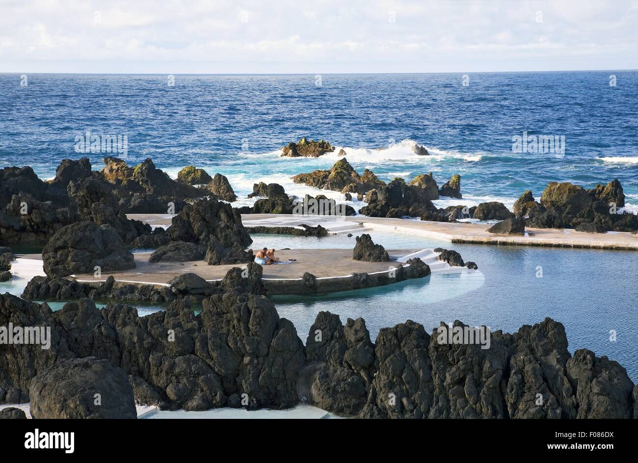 Eroded rocks on beach in Madeira island, Funchal, Portugal Stock Photo ...