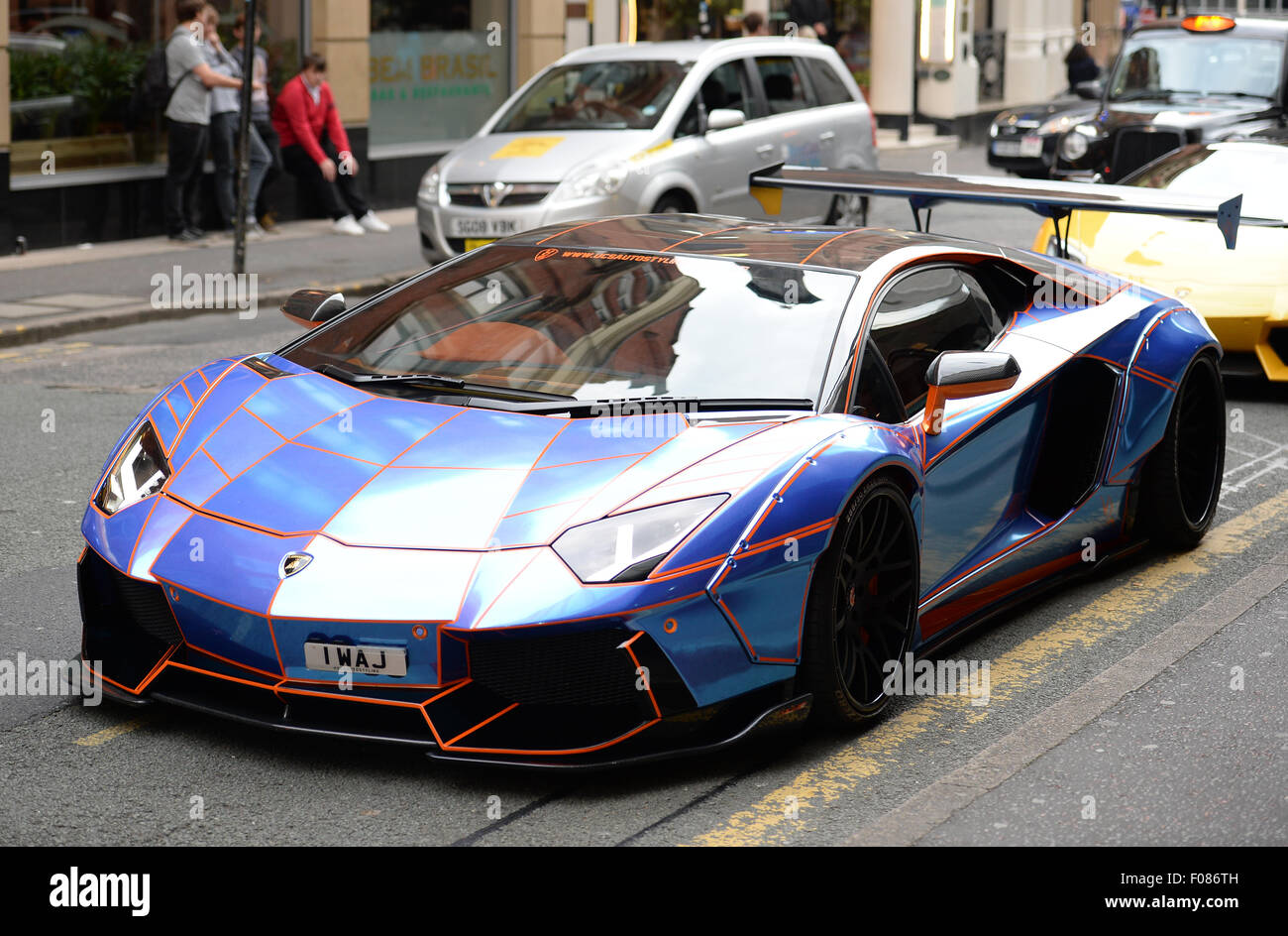 A Lamborghini Aventador with a Tron design cutomised by Oakley Design  parked on double yellow lines in Manchester City Centre Stock Photo - Alamy