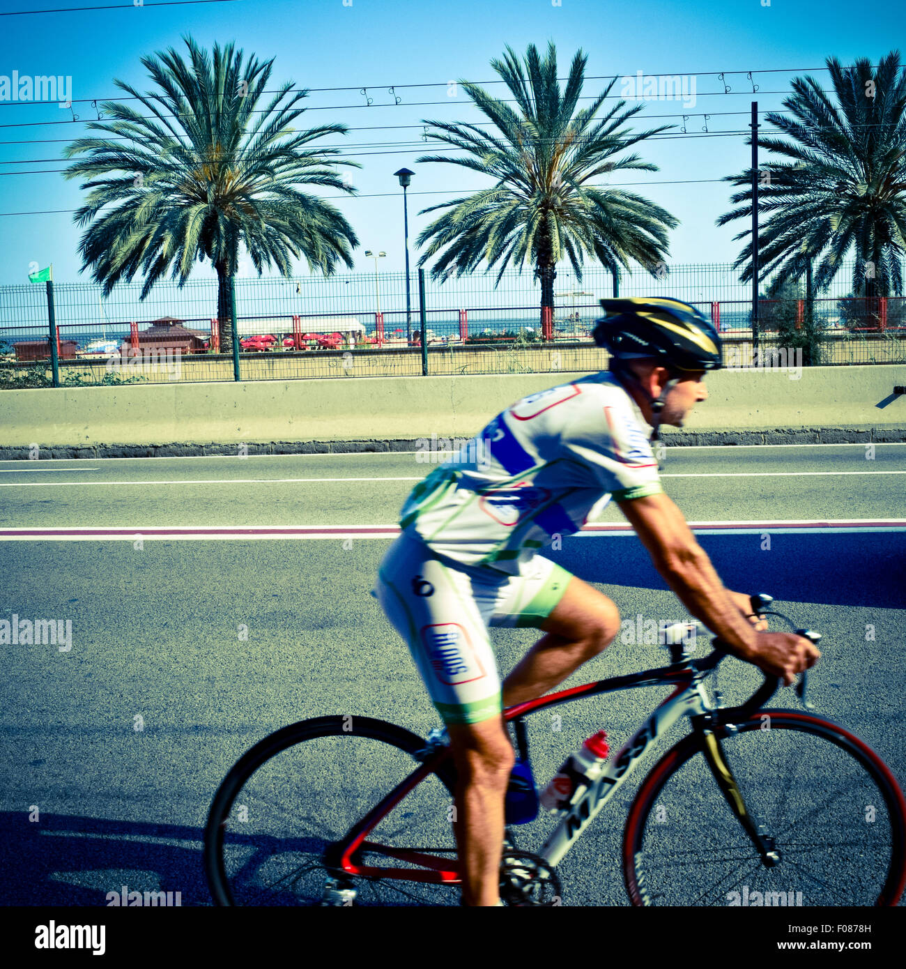Cyclist training on bicycle. N-II road. Maresme, Barcelona province, Catalonia, Spain. Stock Photo