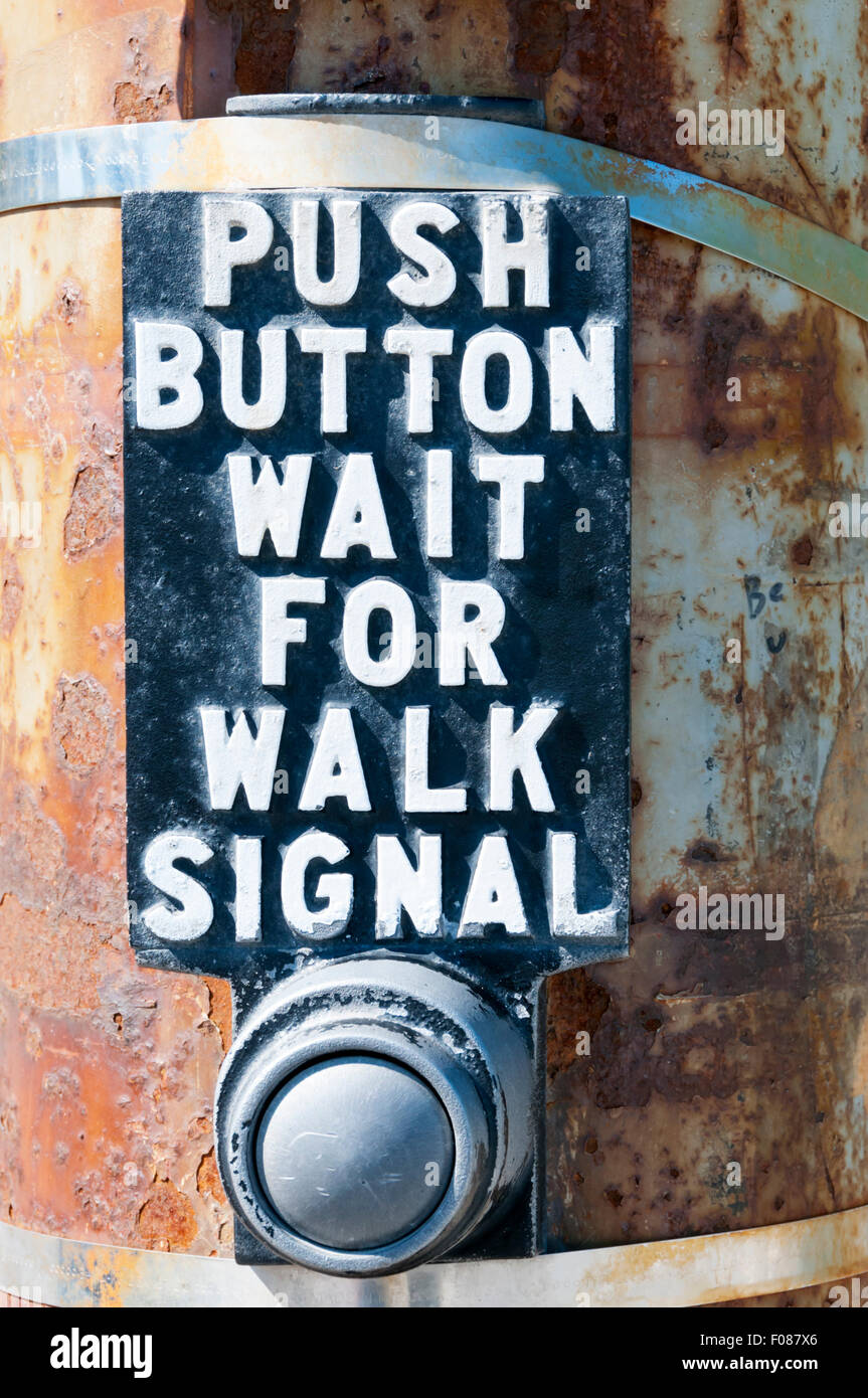 A Push Button Wait For Walk Signal sign. Stock Photo