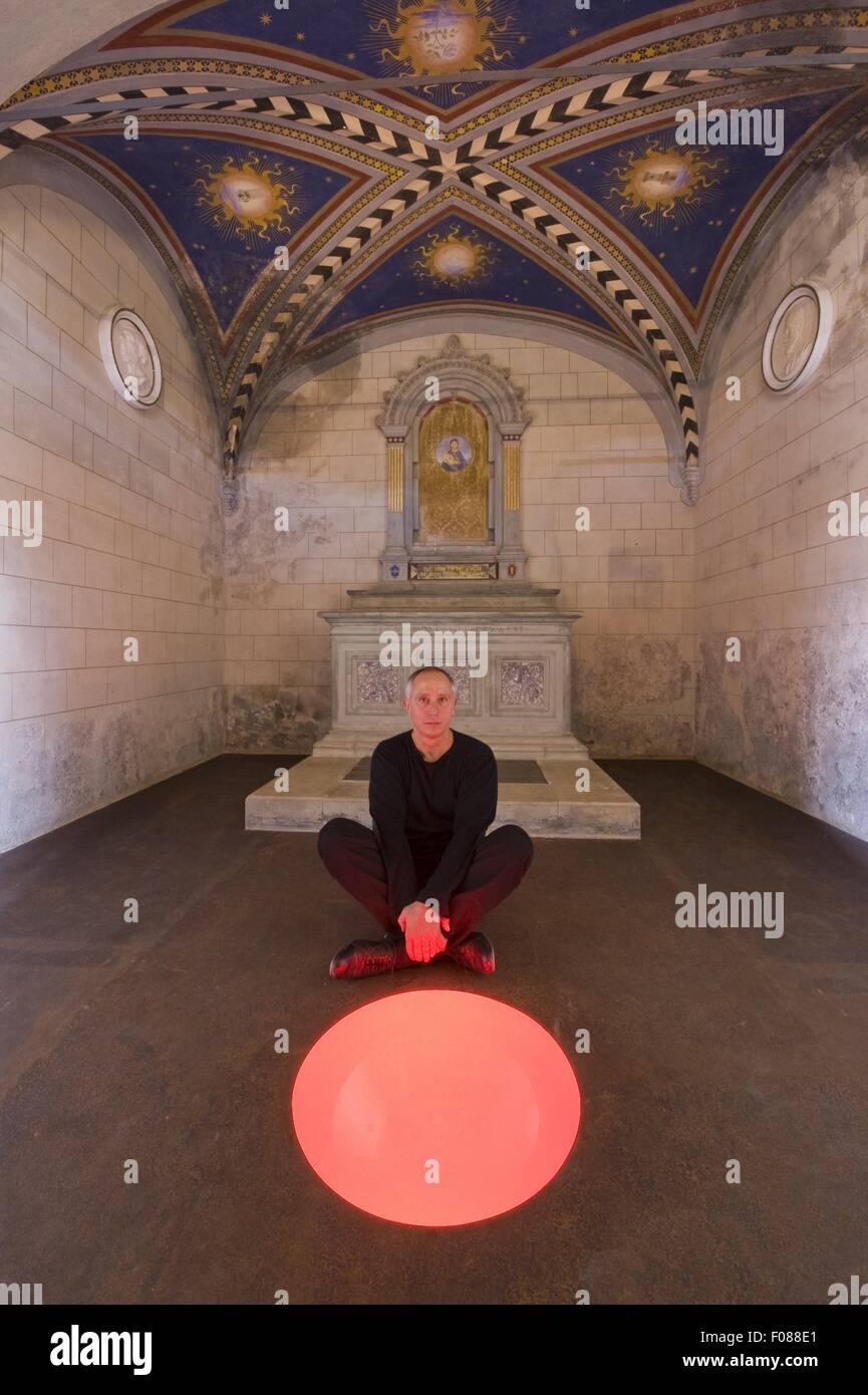 Winemaker Marco Pallanti sitting on floor, Castello di Ama, Italy Stock Photo