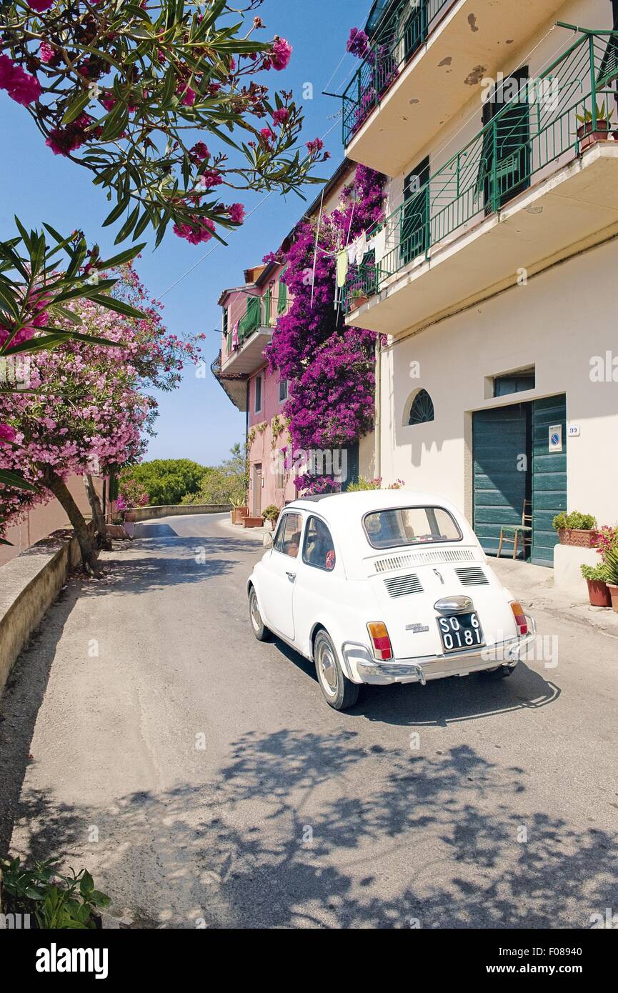 View of car driving through narrow streets in Capoliveri, Elba, Italy