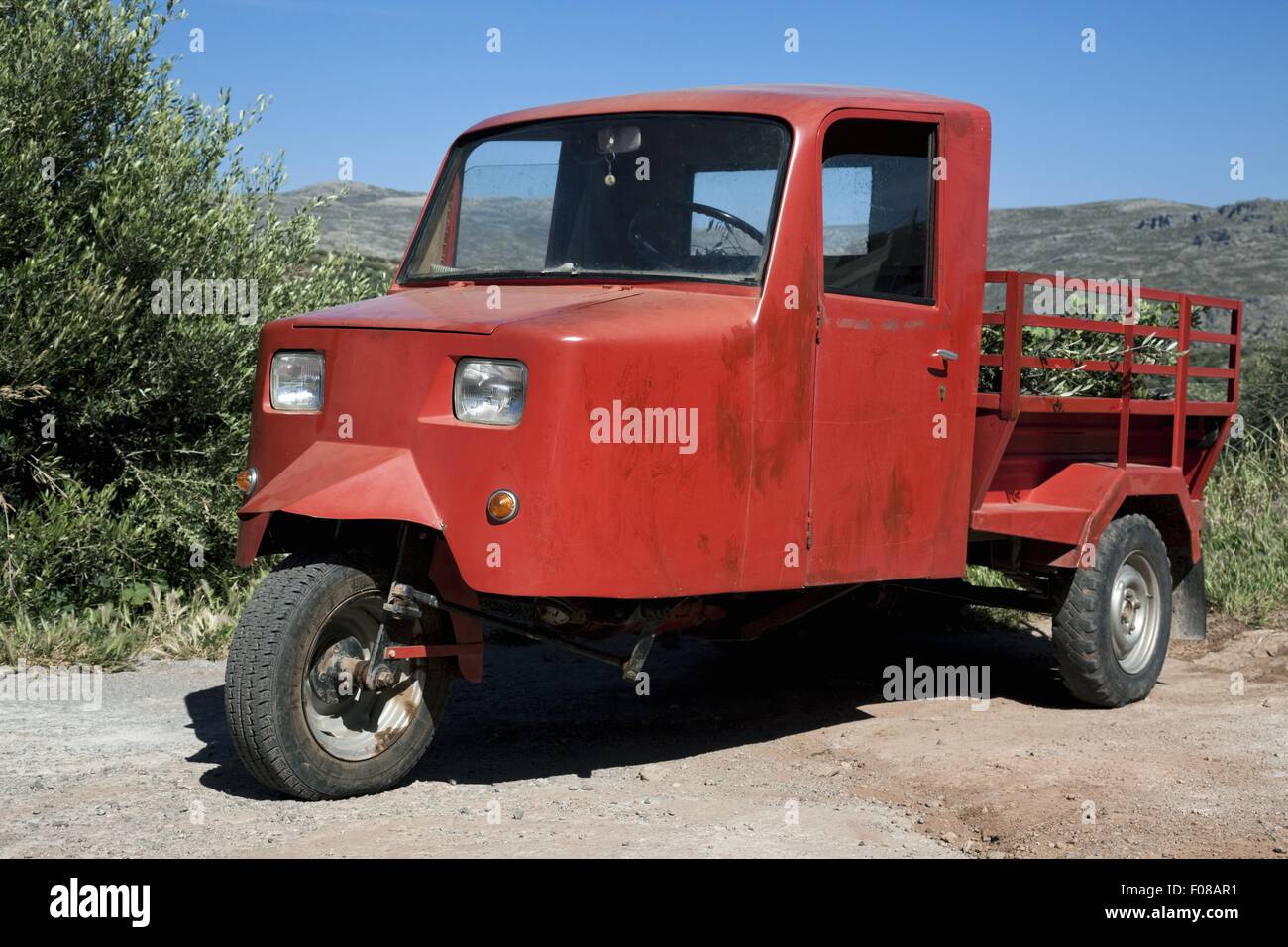 Red Tricycle in Crete, Greek Stock Photo Alamy
