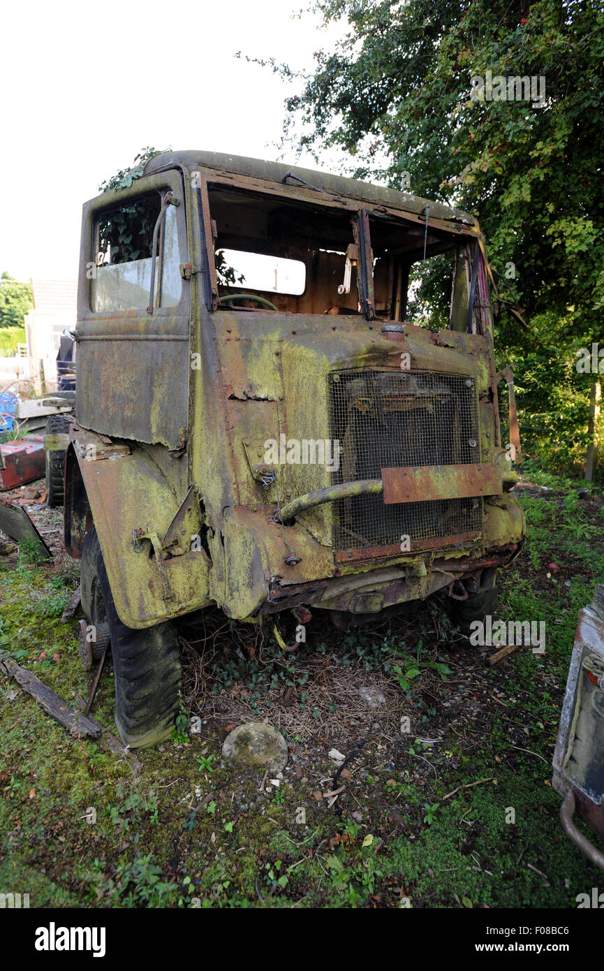 Classic Land Rovers rotting in a breakers yard - truck Stock Photo