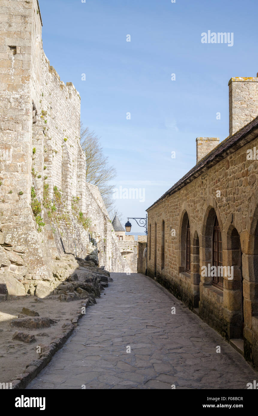 Historic narrow, cobbled street at the UNESCO World Heritage site of Le Mont St-Michel, Normandy, France Stock Photo