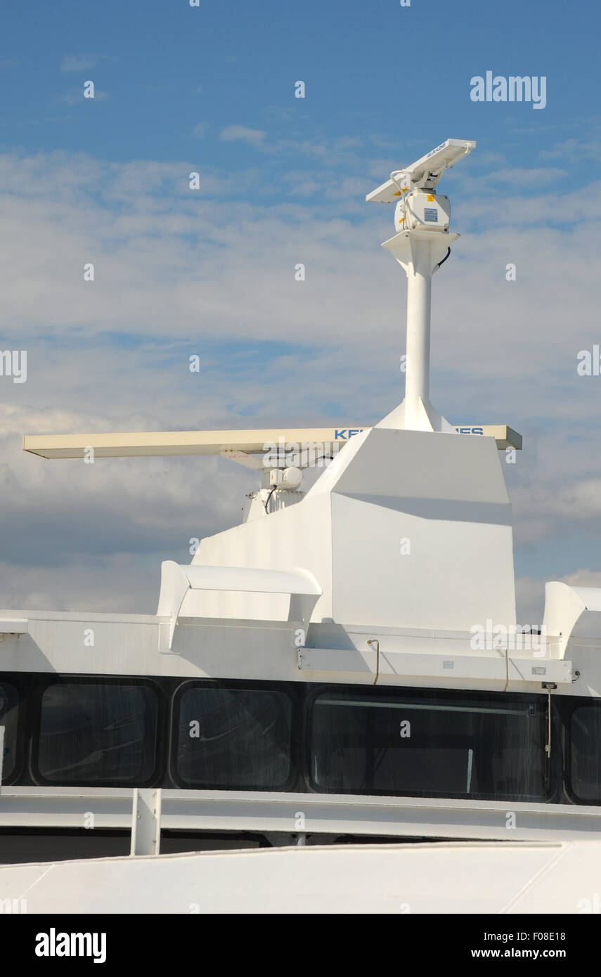 A ships radar transmitter receiver system fitted to the vessels mast. Stock Photo