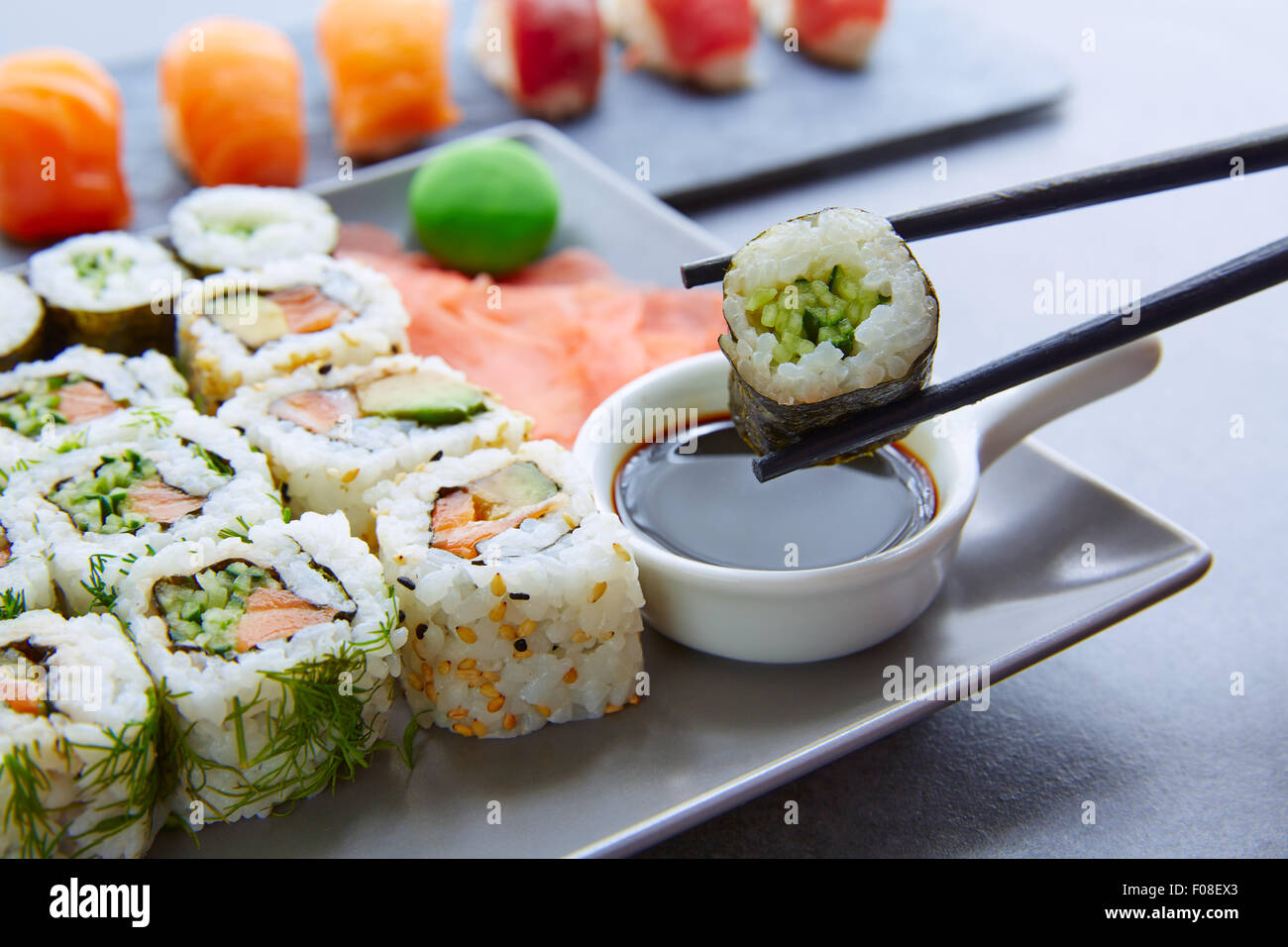 Sushi Maki and Niguiri with soy sauce and wasabi with California Roll Stock  Photo - Alamy