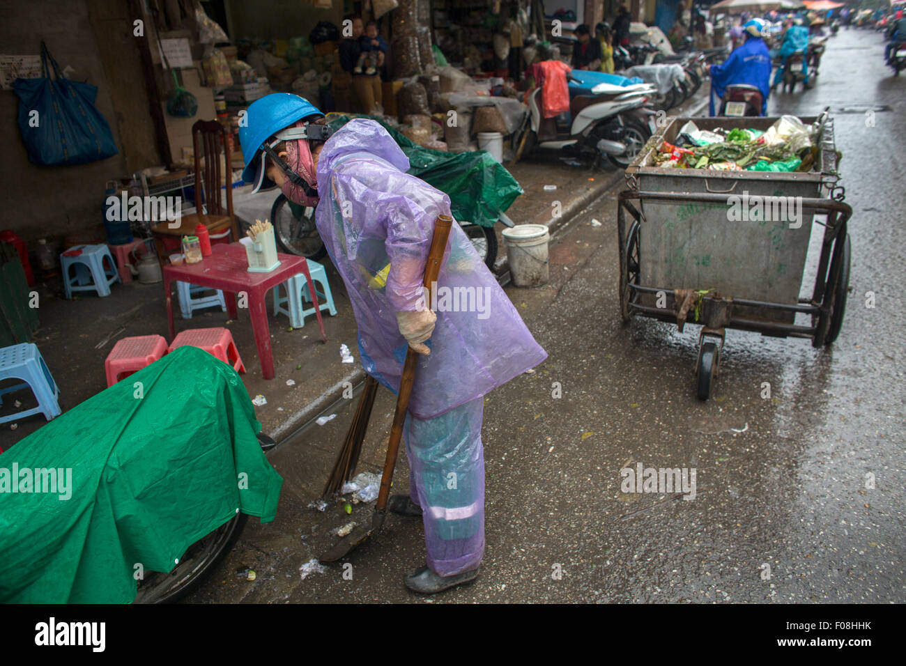 street sweeper at work in Hanoi city, Vietnam Stock Photo