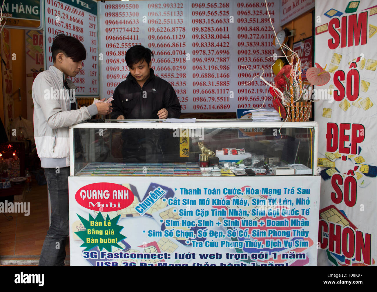 mobile telephone vendor in Vietnam Stock Photo
