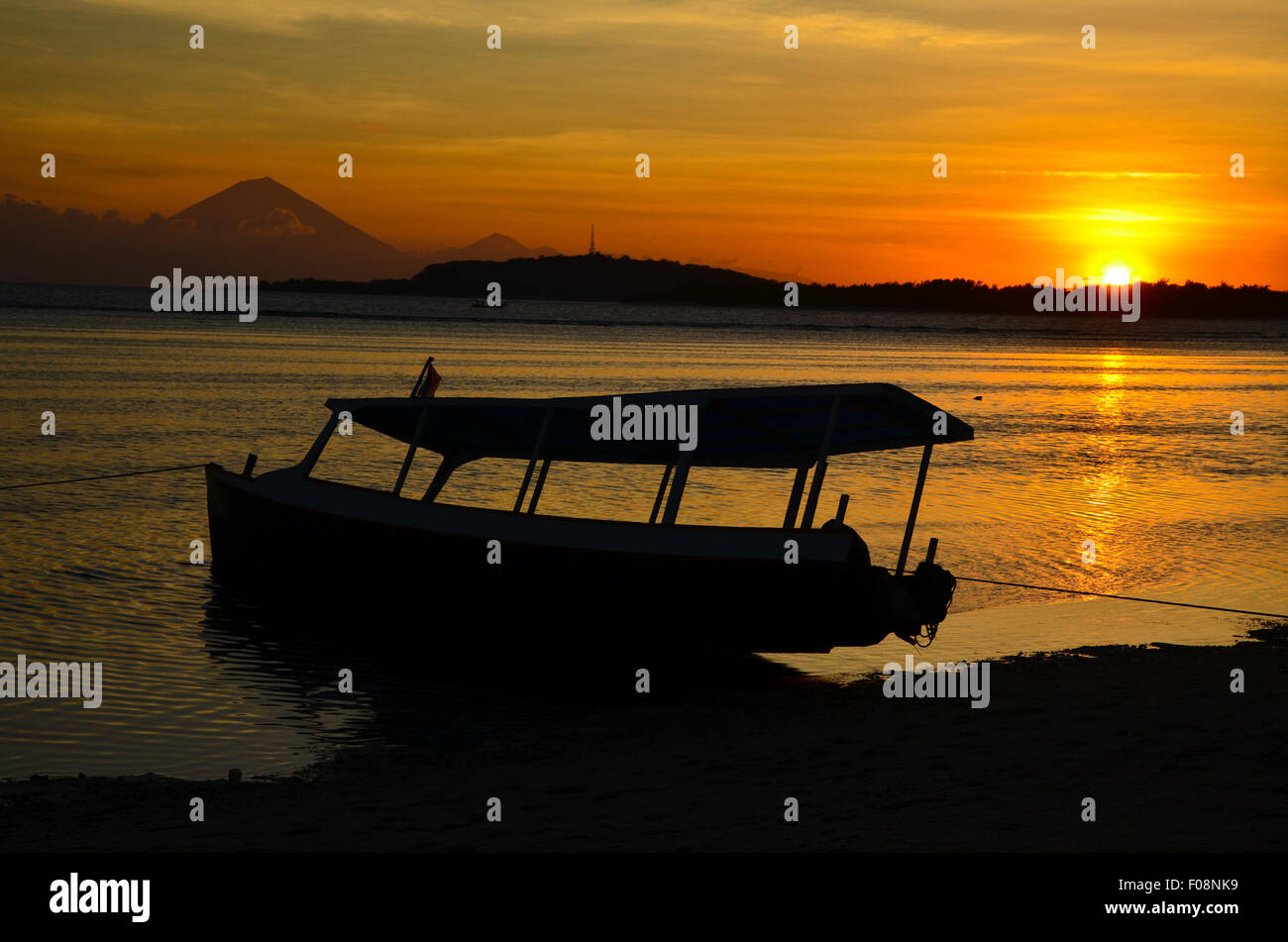 Sunset on the beach in Bali Stock Photo - Alamy