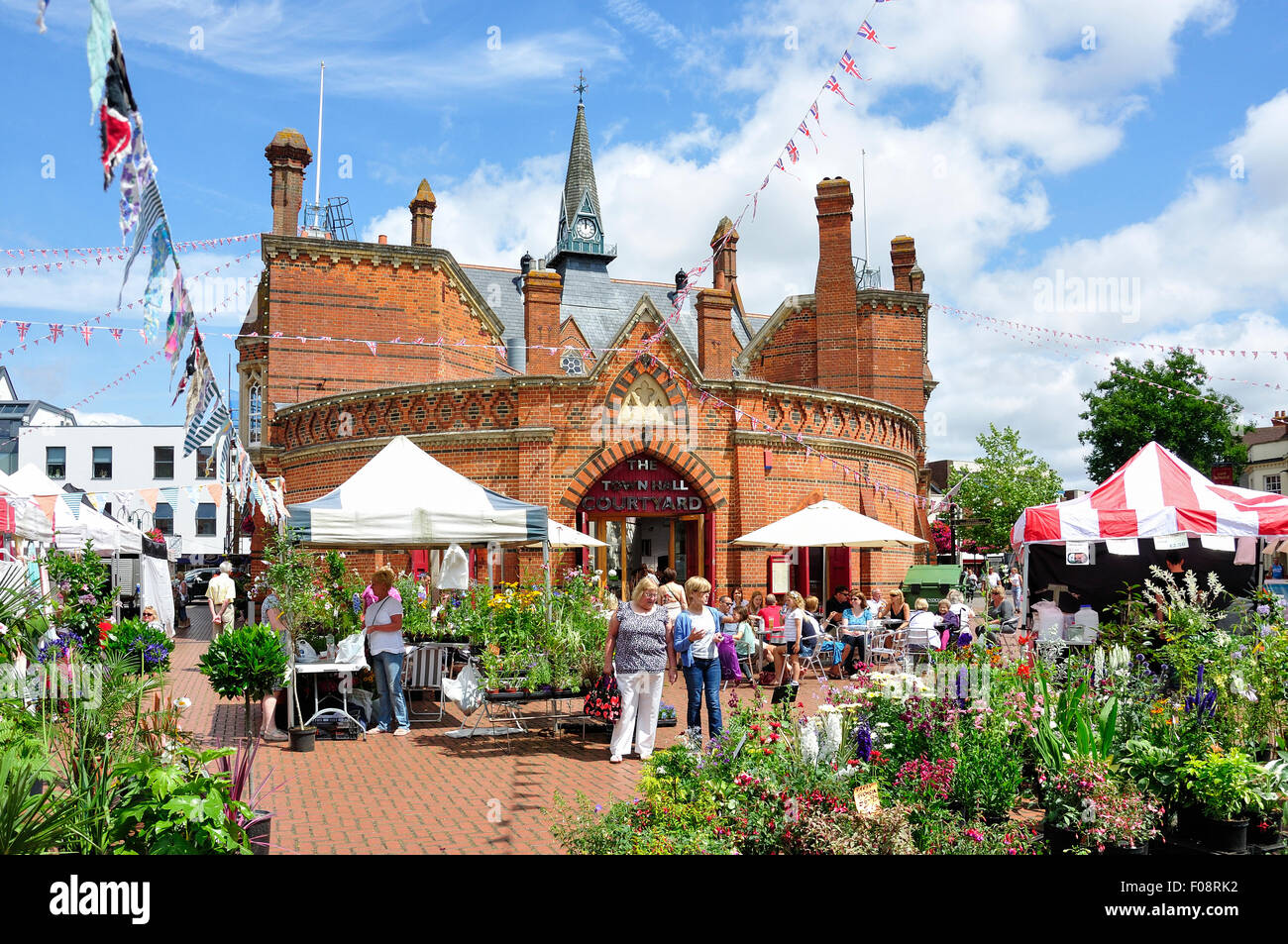 Outdoor stalls on Market Day by Wokingham Town Hall, Market Place, Wokingham, Berkshire, England, United Kingdom Stock Photo