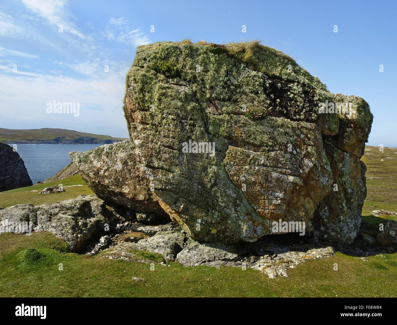 Big rock with sky in background at Inishbofin, Ireland Stock Photo - Alamy