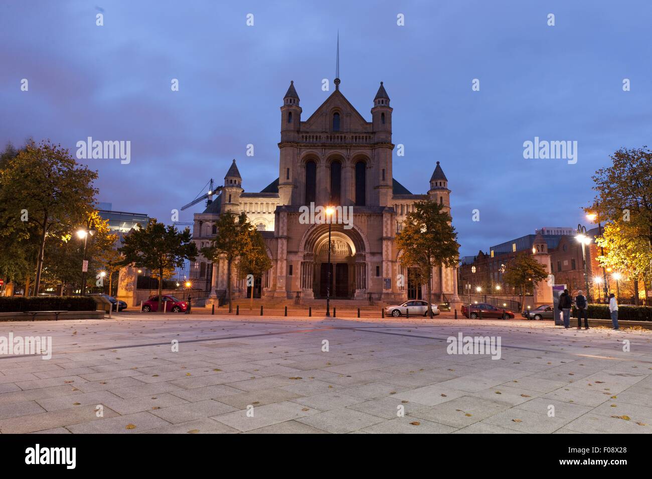 Facade of St. Annes Cathedral illuminated at night in Belfast, Ireland Stock Photo