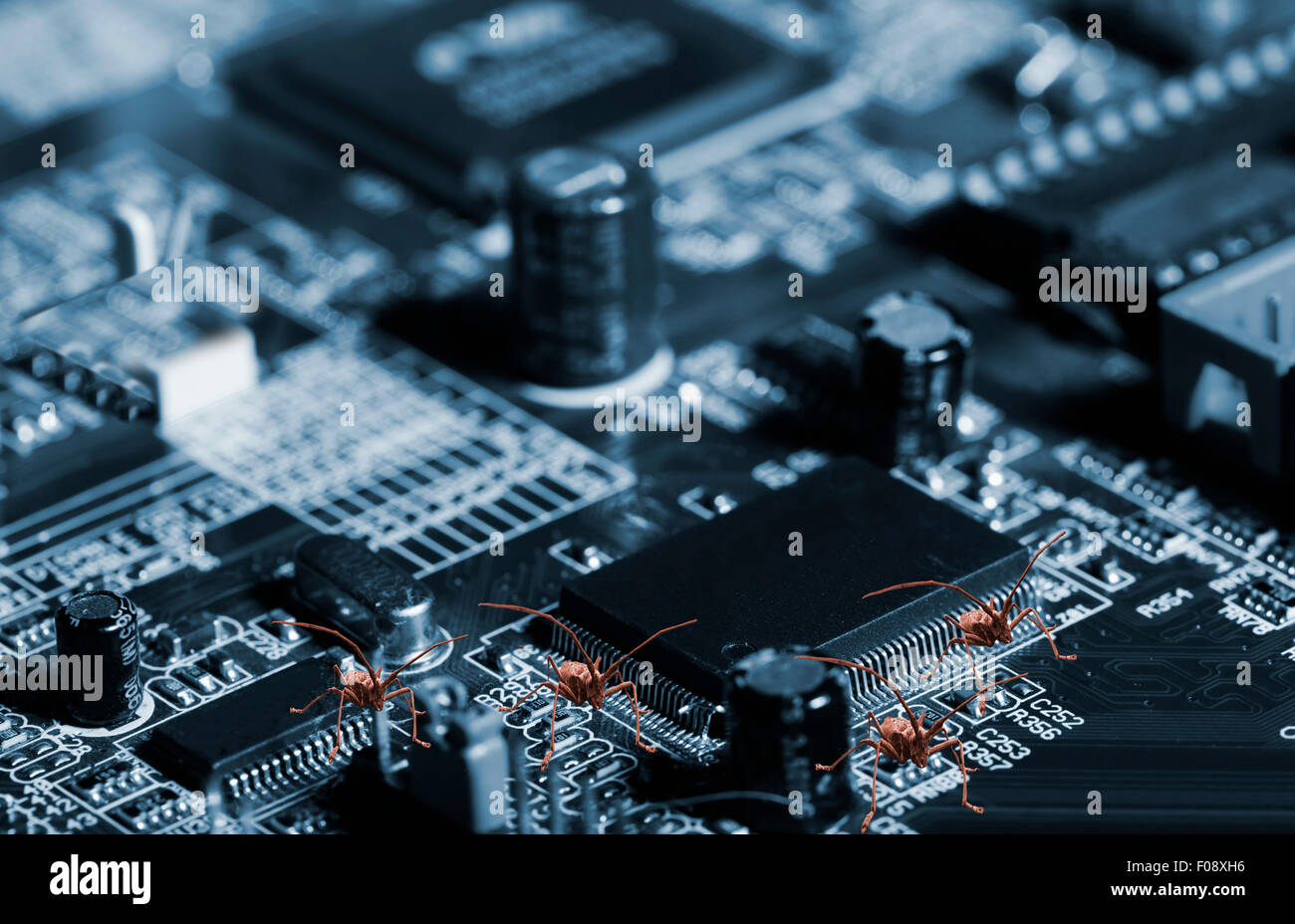 computer bugs, viruses jumping over circuit-board and microchips Stock Photo