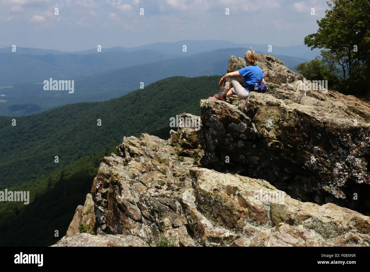Hikers on rocks at Shenandoah National Park, Blue Ridge Mountains, Virginia Stock Photo