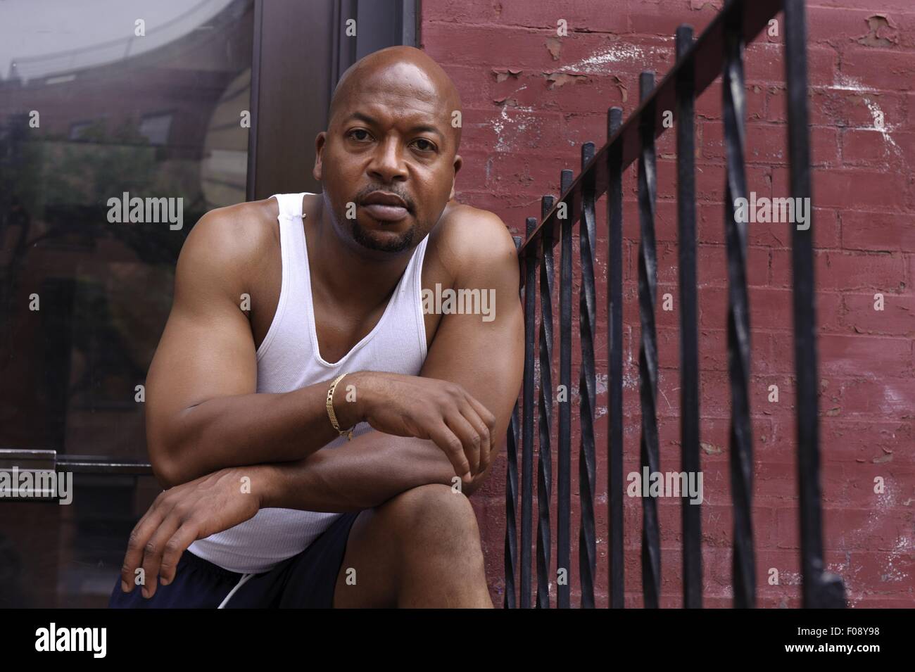 Portrait of man wearing white vest in New York, USA Stock Photo - Alamy