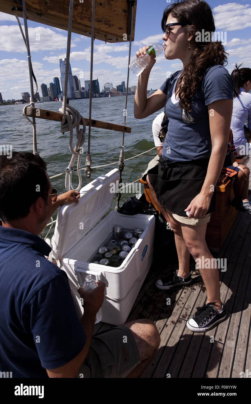 Two women enjoying on sailboat in Hudson river, New York, USA Stock Photo