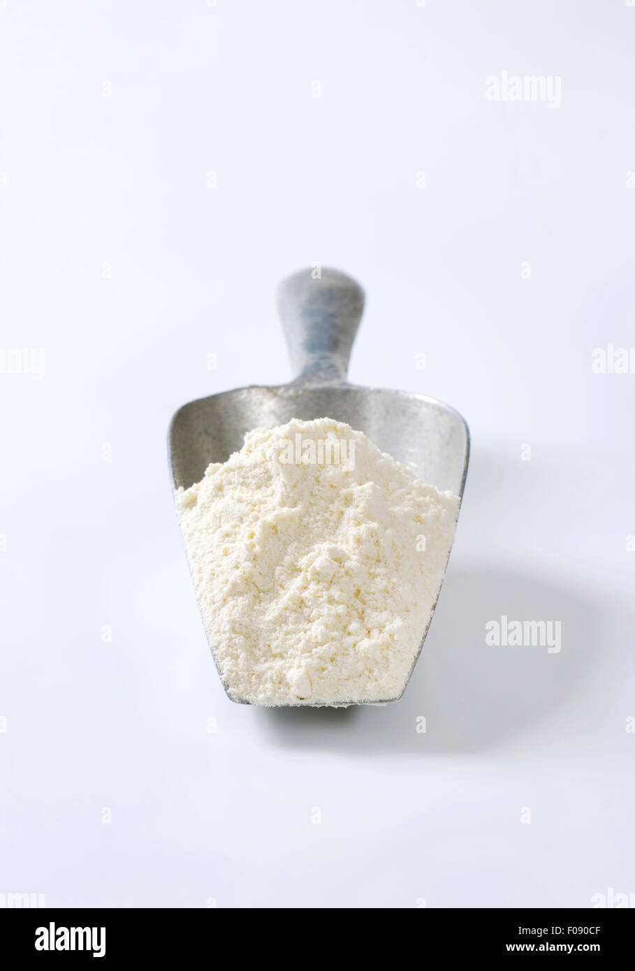 Metal scoop of finely ground flour Stock Photo