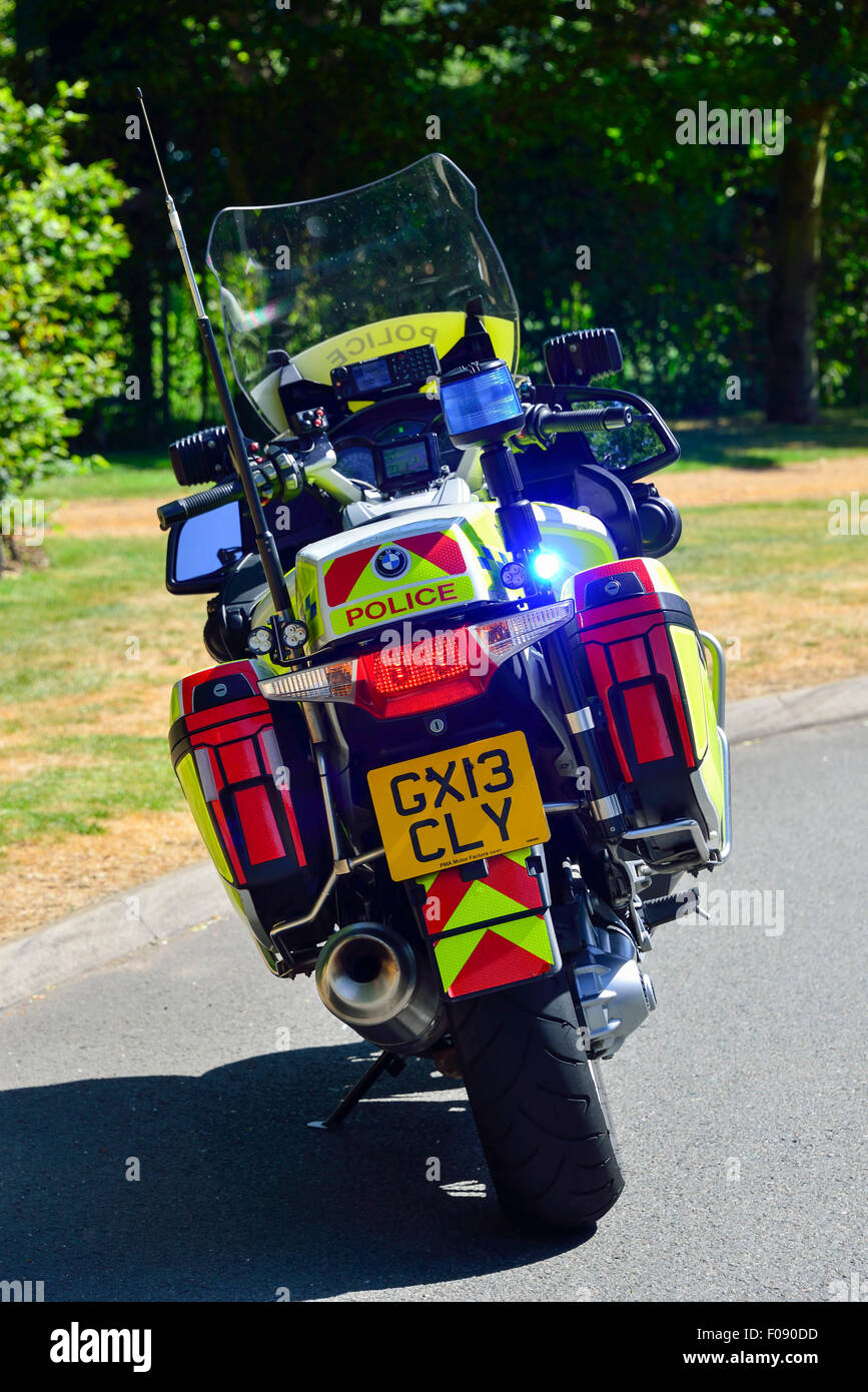 Police motorbike parked with flashing lights, Runnymede, Surrey, England, United Kingdom Stock Photo