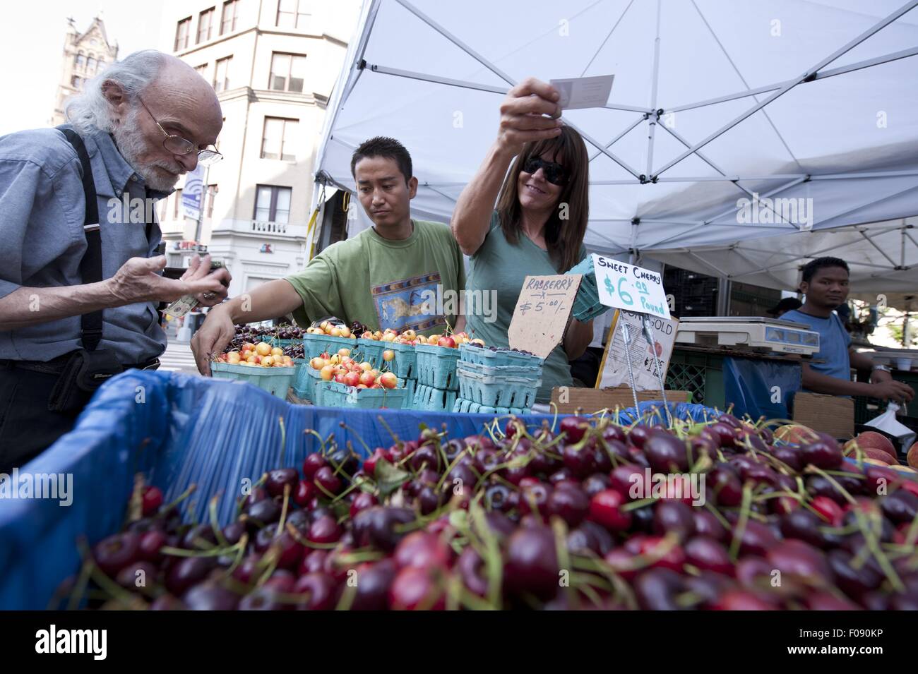 People buying fruits in Greenmarket at Union Square, New York, USA Stock Photo