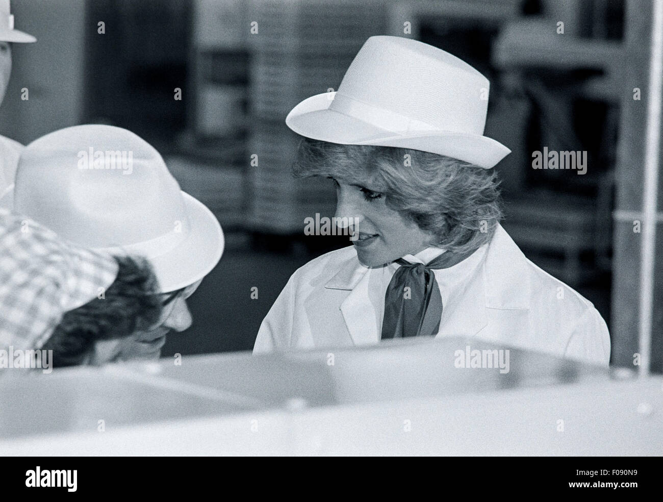 Princess Diana wears a White Coat and Hat to visit the Smith-Kendon sweet factory at Bridgend. 1986 Stock Photo