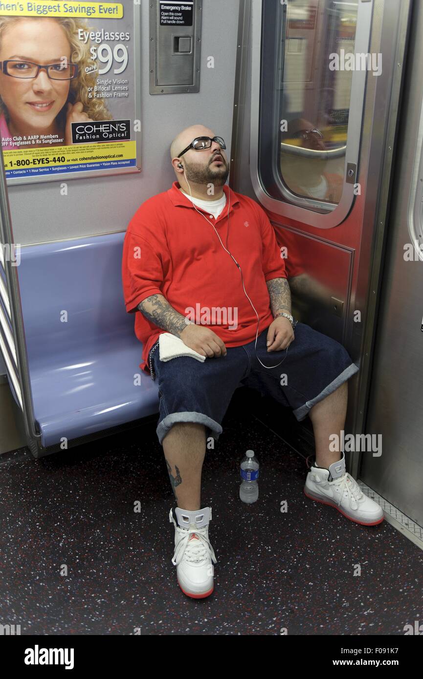 Bald man sleeping in subway, New York, USA Stock Photo