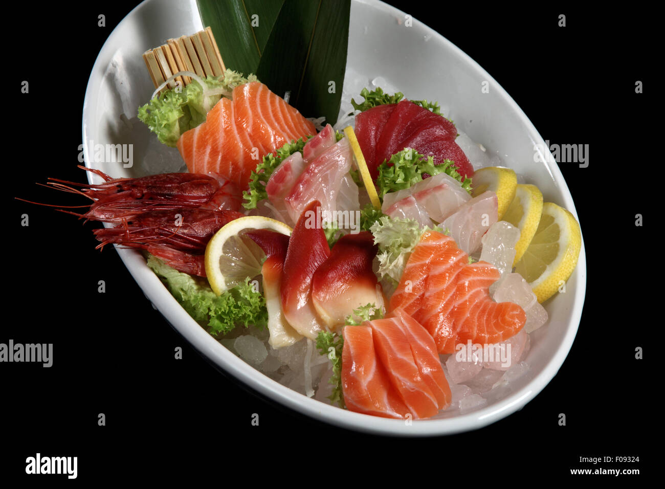 Salmon sashimi and shrimp tempura roll hires stock photography and