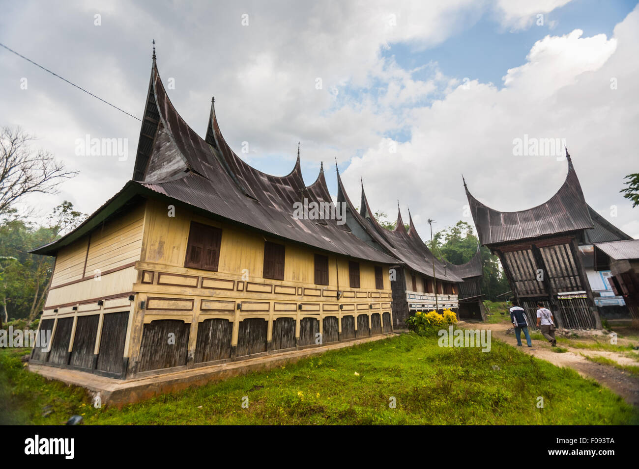 Traditional house of Minangkabau with its water buffalo horn-shaped roof in Bukittinggi, West Sumatra, Indonesia. Stock Photo